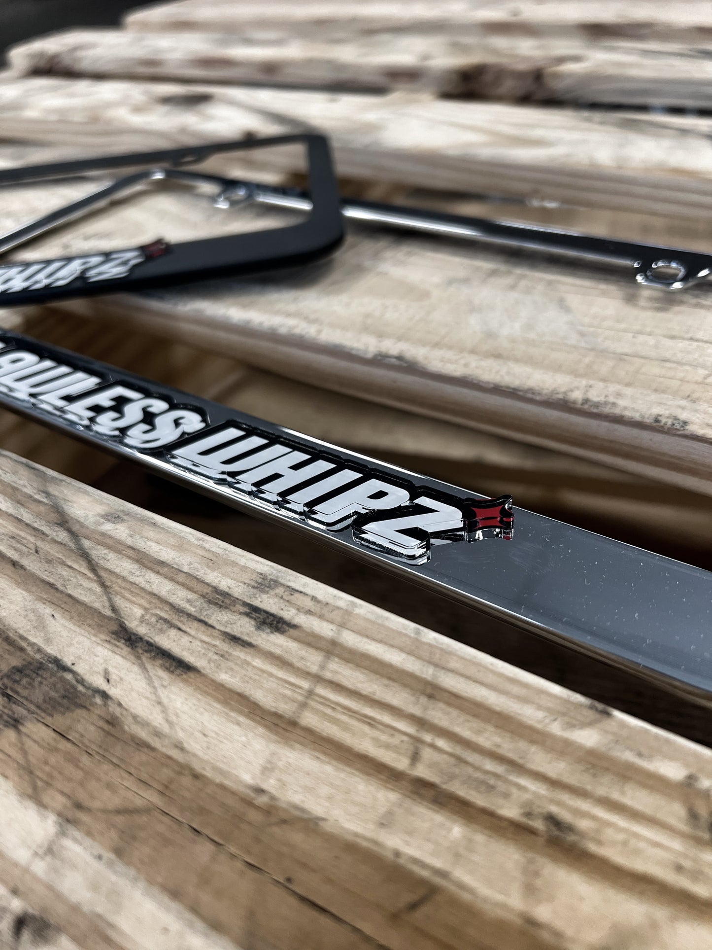 Flawless Whipz License Plate Frame